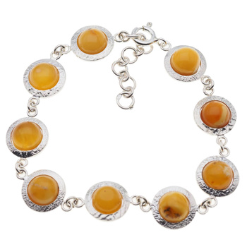 Bransoletka - mleczny bursztyn okrągły i srebro młotkowane