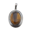 Zawieszka z owalnym Tygrysim Okiem w srebrze oksydowanym.