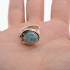 Pierścionek regulowany z okrąłym Larimarem w srebrze oksydowanym z liściem