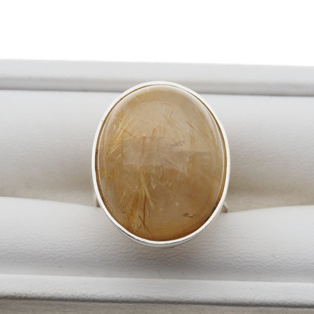 Pierścionek regulowany z owalnym Kwarcem Rutylowym ze złotą nitką w srebrze.