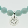 Bransoletka 18 cm - Jadeit miętowy kulki i srebrna zawieszka słońce