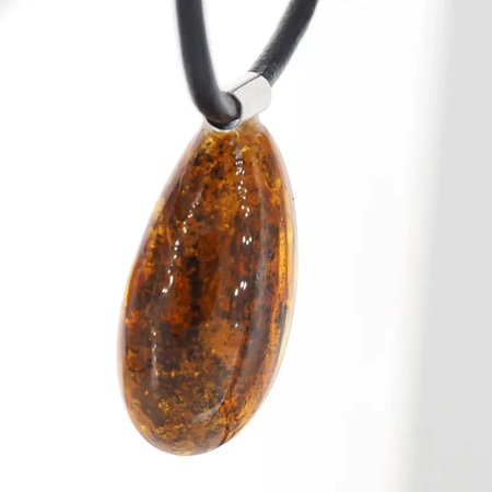 Naszyjnik  na rzemieniu -  przezroczysty Bursztyn z inkluzją roślinną