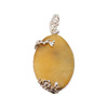 Zawieszka - owalny Bursztyn mleczny w srebrze 