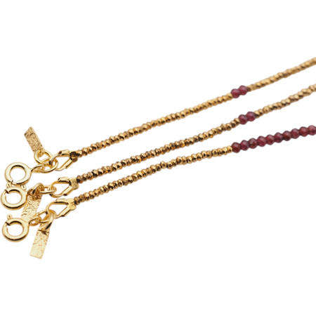 Bransoletka urodzeniowa styczeń - granat, złoty hematyt i srebro złocone