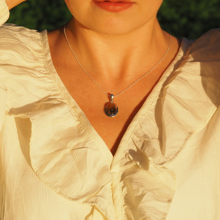 Zawieszka z owalnym Kamieniem Słonecznym w srebrze rodowanym