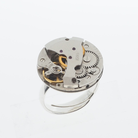 Pierścionek regulowany z mechanizmem zegarka w srebrze.