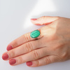 Pierścionek regulowany z owalnym Malachitem w srebrze rodowanym.