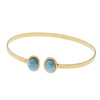 Bransoletka sztywna z owalnym Larimarem w młotkowanym srebrze złoconym