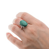 Pierścionek regulowany z owalnym Malachitem w srebrze rodowanym.