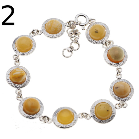 Bransoletka - mleczny bursztyn okrągły i srebro młotkowane