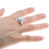 Pierścionek regulowany z okrągłym Larimarem w srebrze młotkowanym