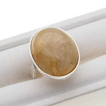 Pierścionek regulowany z owalnym Kwarcem Rutylowym ze złotą nitką w srebrze.