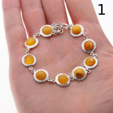 Bransoletka - mleczny bursztyn okrągły i srebro młotkowane