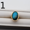 Pierścionek regulowany - Turkus z malachitem owalny w złoconym srebrze młotkowanym