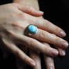 Pierścionek regulowany z owalnym Larimarem w srebrze rodowanym