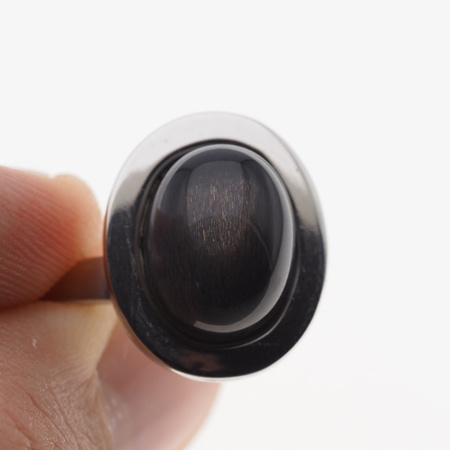 Pierścionek regulowany z owalnym Kamieniem Słonecznym w srebrze rodowanym.