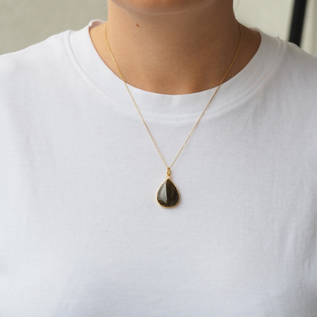 Zawieszka z owalnym malachitem w srebrze rodowanym