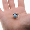 Pierścionek regulowany z okrągłym Larimarem w srebrze
