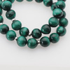 Bransoletka na gumce - malachit kulki 8,5 mm i srebro