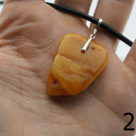 Naszyjnik  na rzemieniu - surowy Bursztyn mleczny