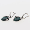 Kolczyki z owalnymi malachitami w srebrze oksydowanym.